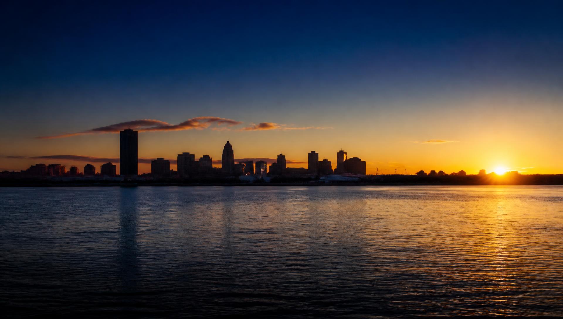 Sunrise over the Buffalo skyline across Lake Erie